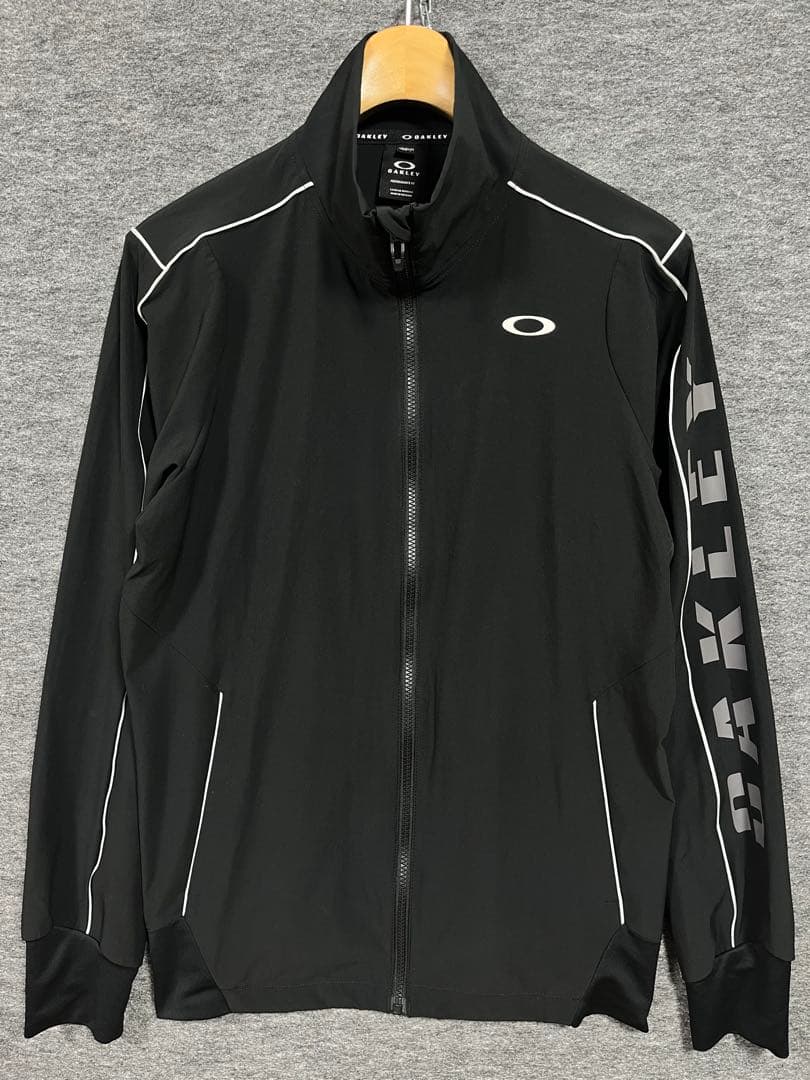 綺麗 OAKLEY オークリー 袖プリント 薄手生地 トラックジャケット 黒 L