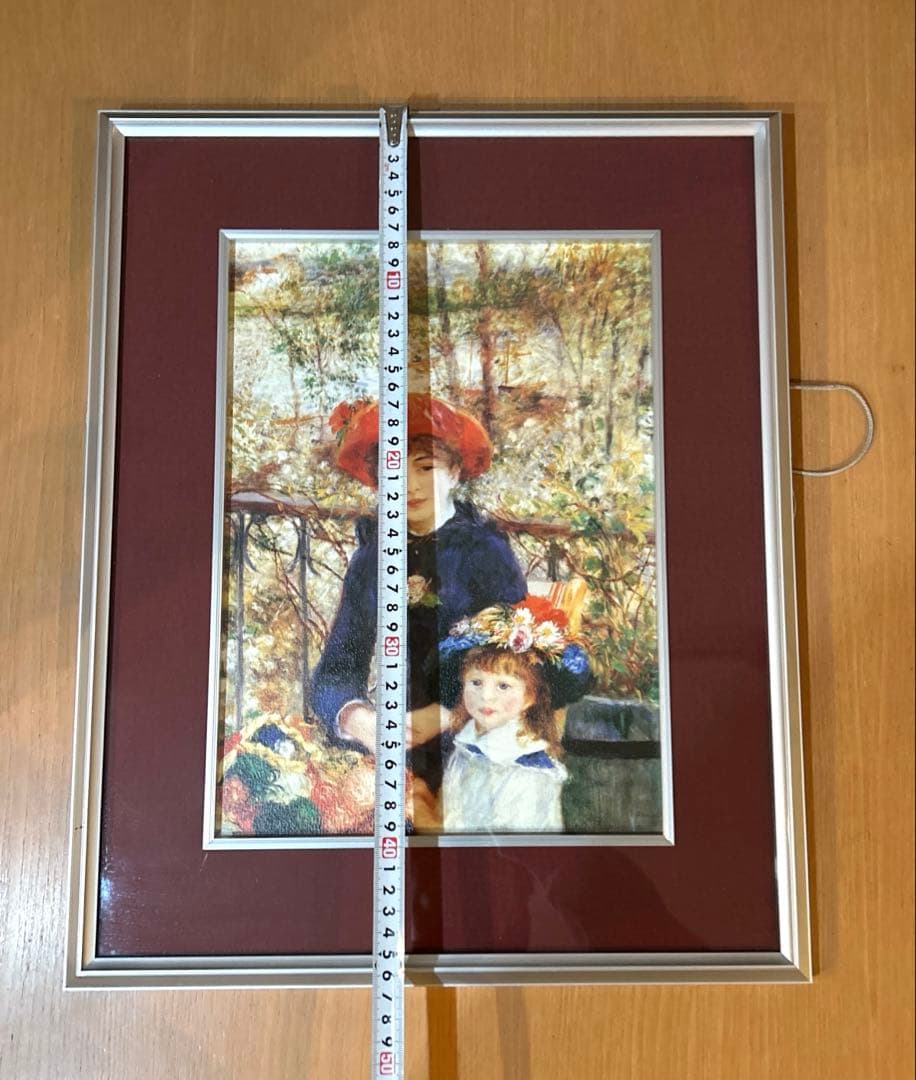 ルノワールの絵画「テラスの母と子」の複製画（A.C.P絵画）