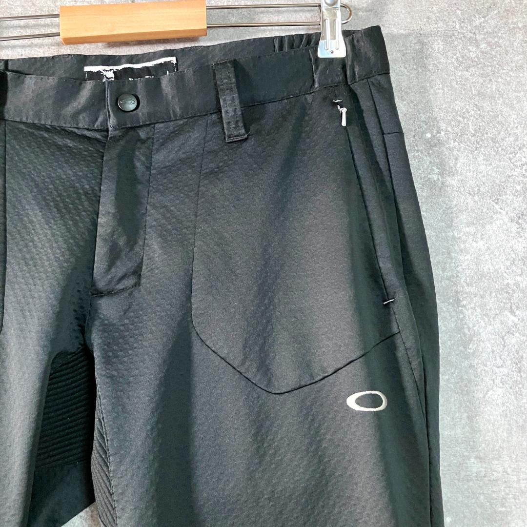 OAKLEY　フィットネスパンツ　ブラック　ロゴ　刺繍　ジップアップ　ワイド