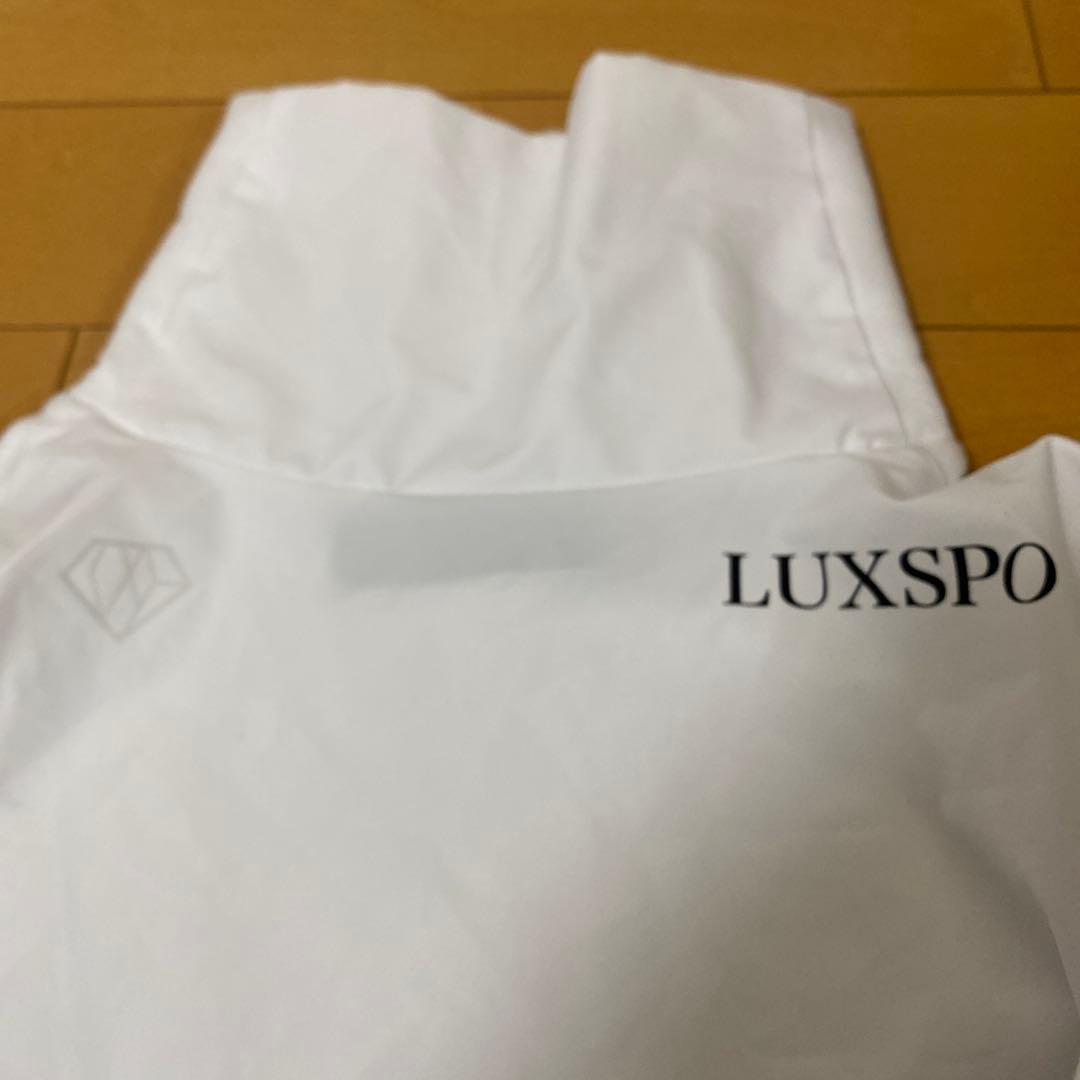 リュクスAKMプラス 防風 ハイネックシャツ ホワイト M ゴルフ LEON掲載