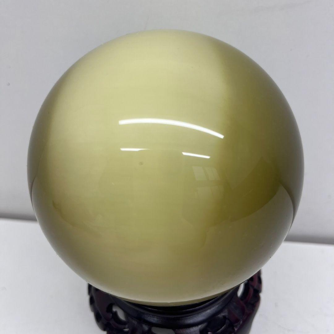 K◇キャッツアイ　丸玉　天然石　ハニー　猫目石1.500g　台座付き