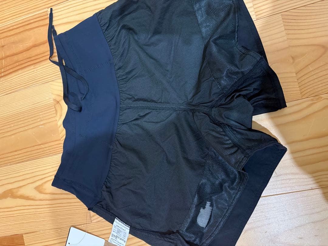 NB42490 フリーランスパートショーツ　メンズM 新品タグ付き