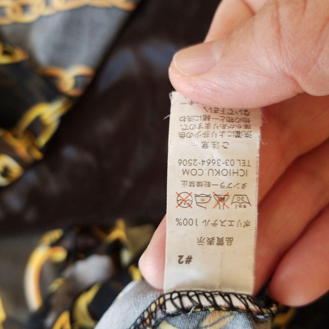 イチオク　フリル付き長袖ドレス 黒と金のチェーン柄