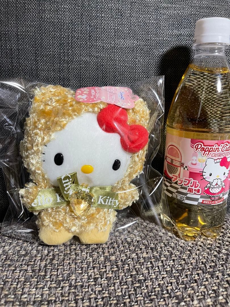 ハローキティ フード付きぬいぐるみがま口ケース