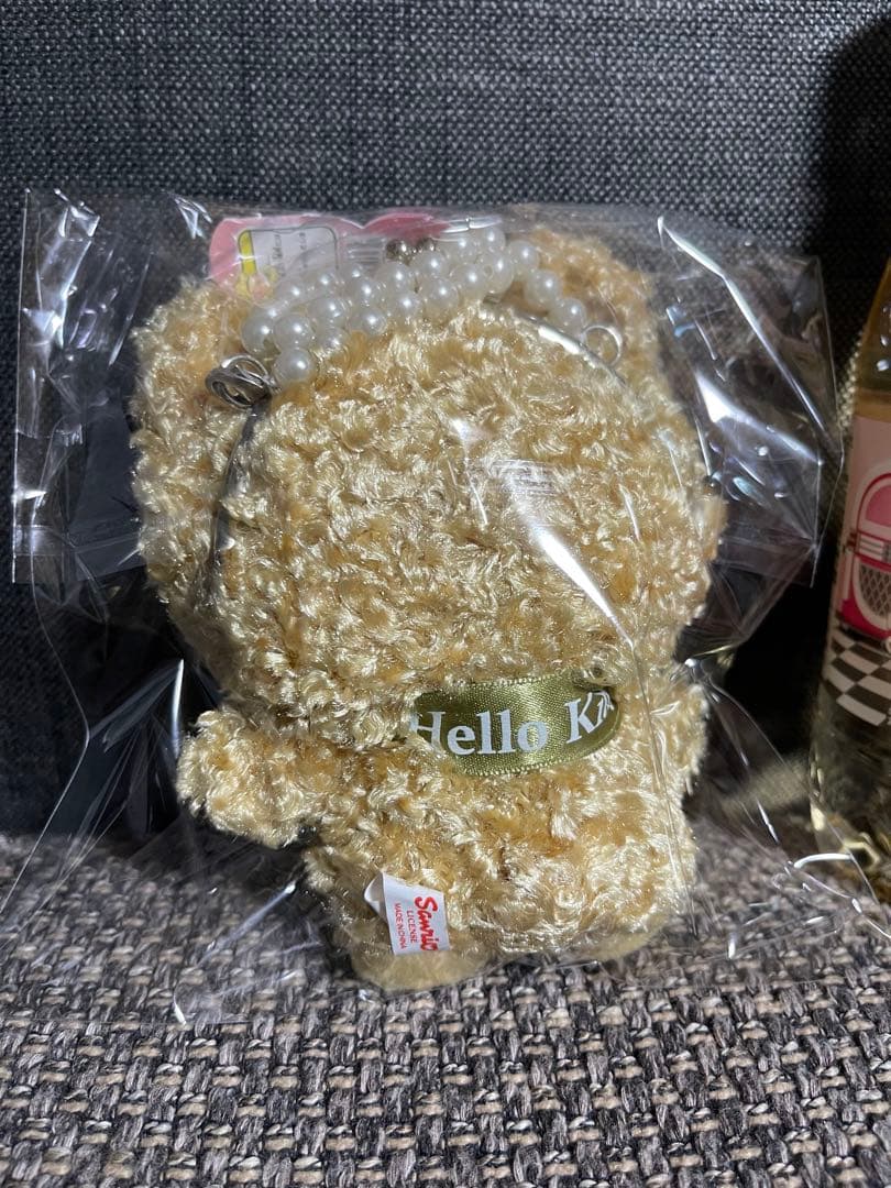 ハローキティ フード付きぬいぐるみがま口ケース
