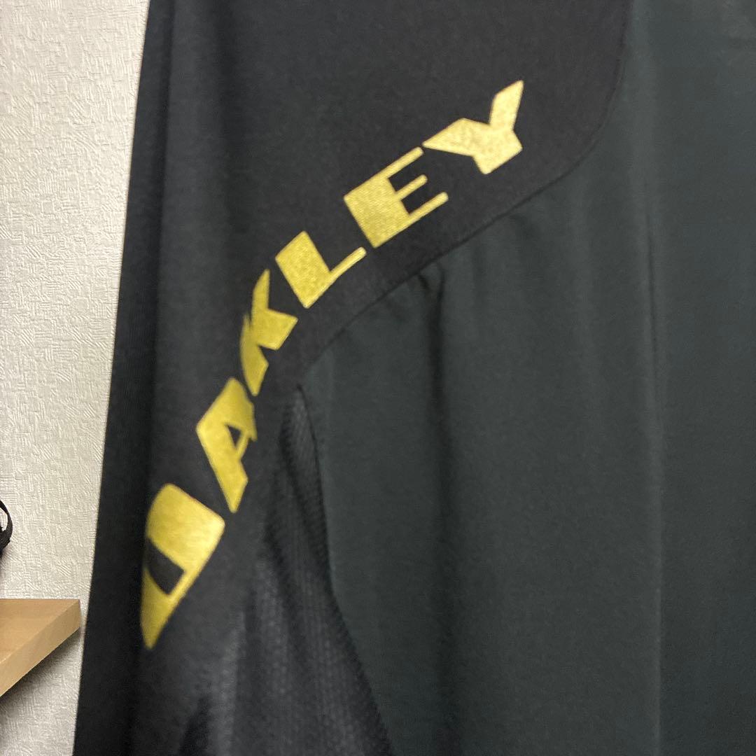 Oakley ブラックゴールド 薄手ソフトジャージ上下セット Lサイズ ゴルフ