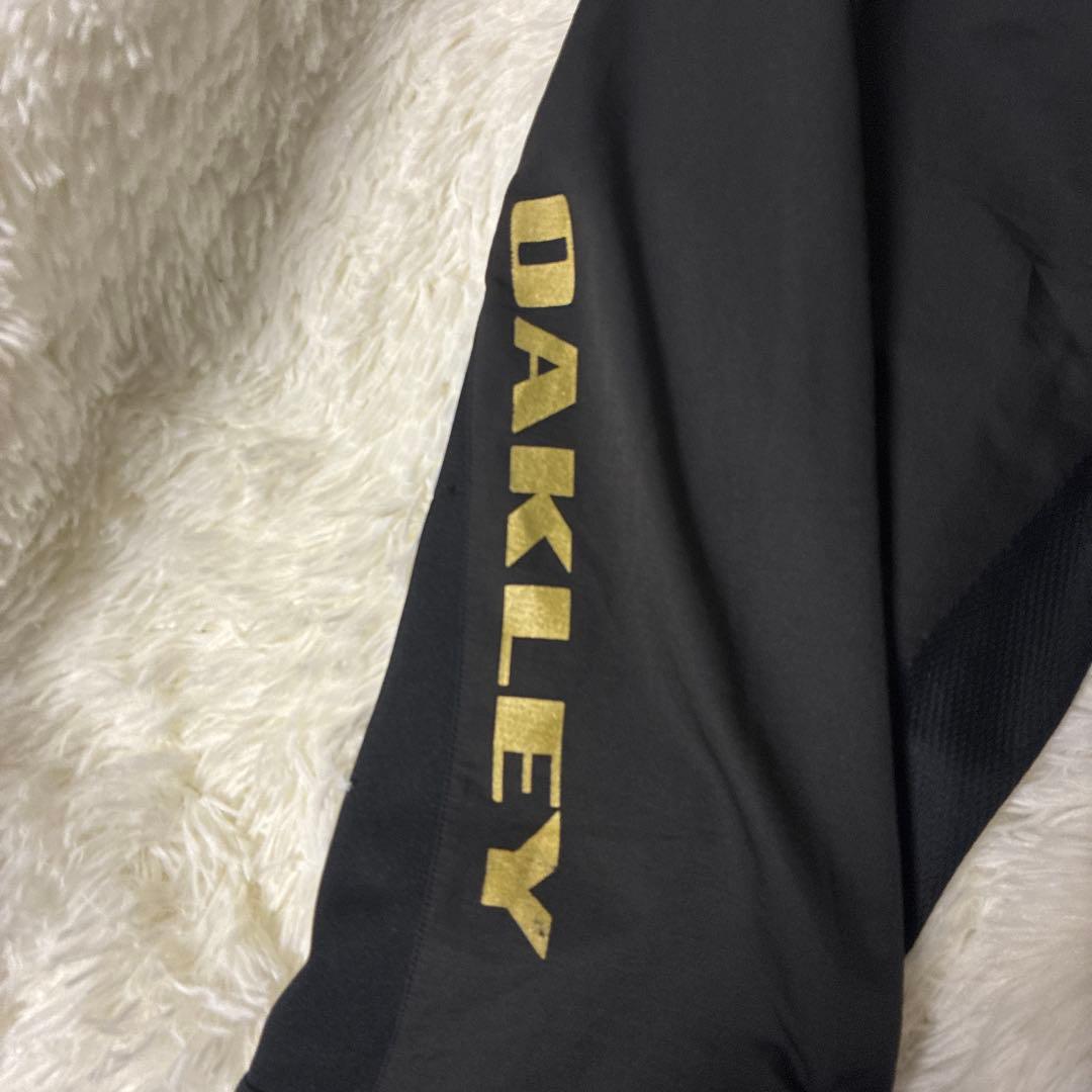 Oakley ブラックゴールド 薄手ソフトジャージ上下セット Lサイズ ゴルフ