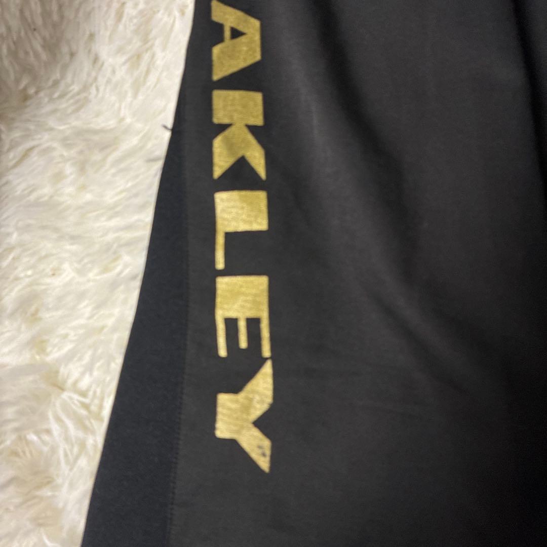 Oakley ブラックゴールド 薄手ソフトジャージ上下セット Lサイズ ゴルフ