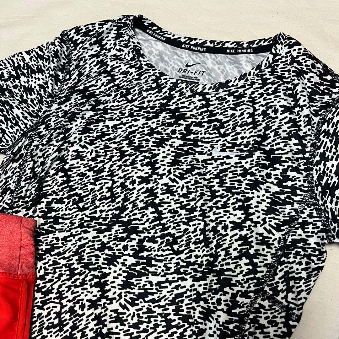 新品✨ナイキ NIKE ランニングウェア 上下セット 白黒 総柄 赤 Lサイズ