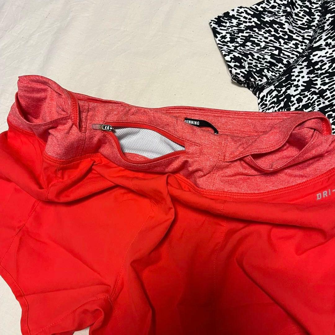 新品✨ナイキ NIKE ランニングウェア 上下セット 白黒 総柄 赤 Lサイズ