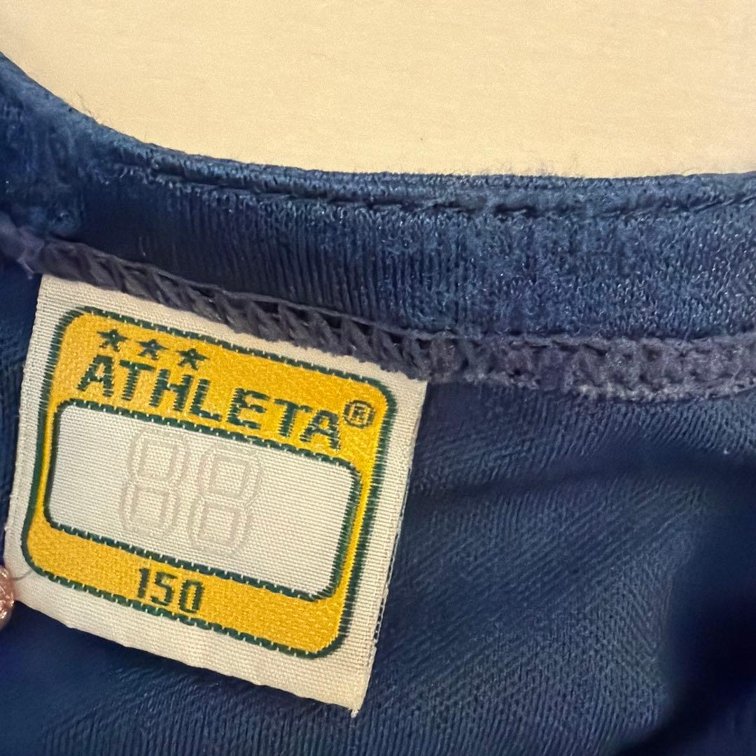 ATHLETA ネイビーシャツ 150サイズ　サッカー　プラクティスシャツ