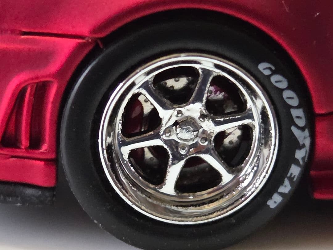 限定700台1/64車魔王AUTOEXPO2025日産スカイラインGT-R34赤