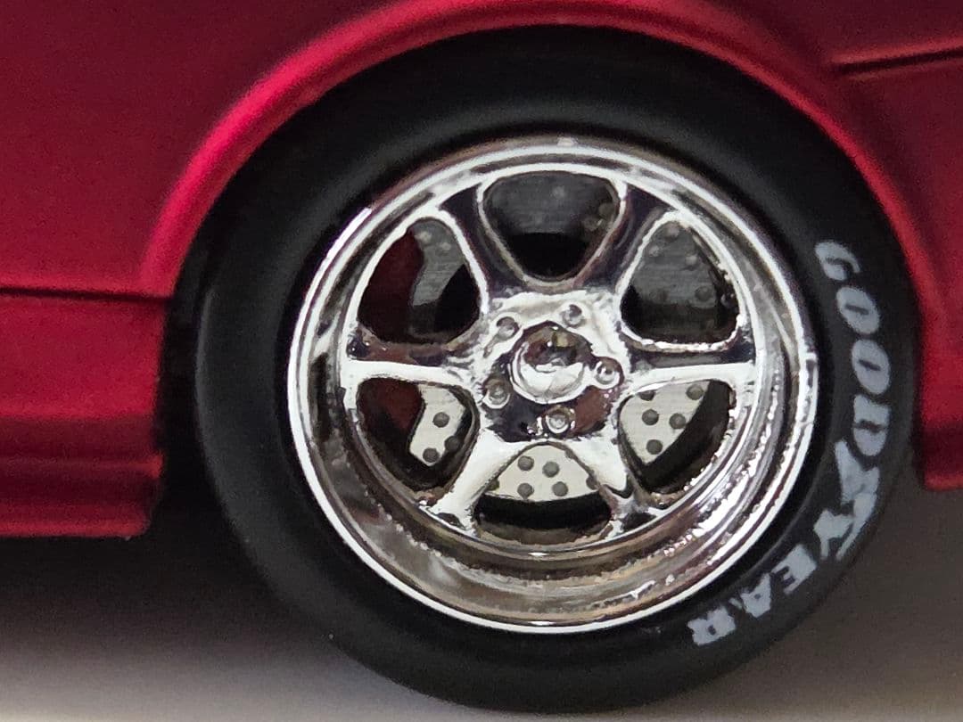 限定700台1/64車魔王AUTOEXPO2025日産スカイラインGT-R34赤