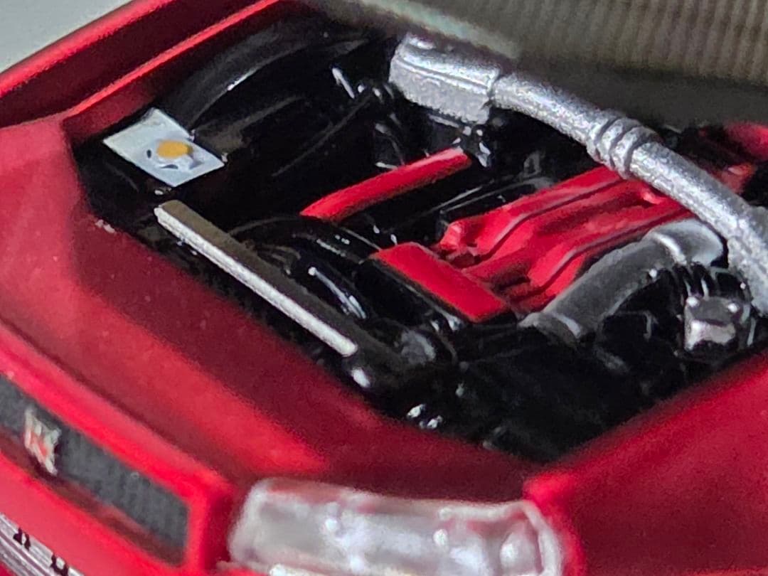限定700台1/64車魔王AUTOEXPO2025日産スカイラインGT-R34赤