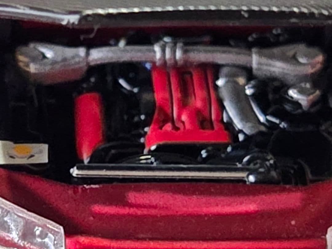 限定700台1/64車魔王AUTOEXPO2025日産スカイラインGT-R34赤