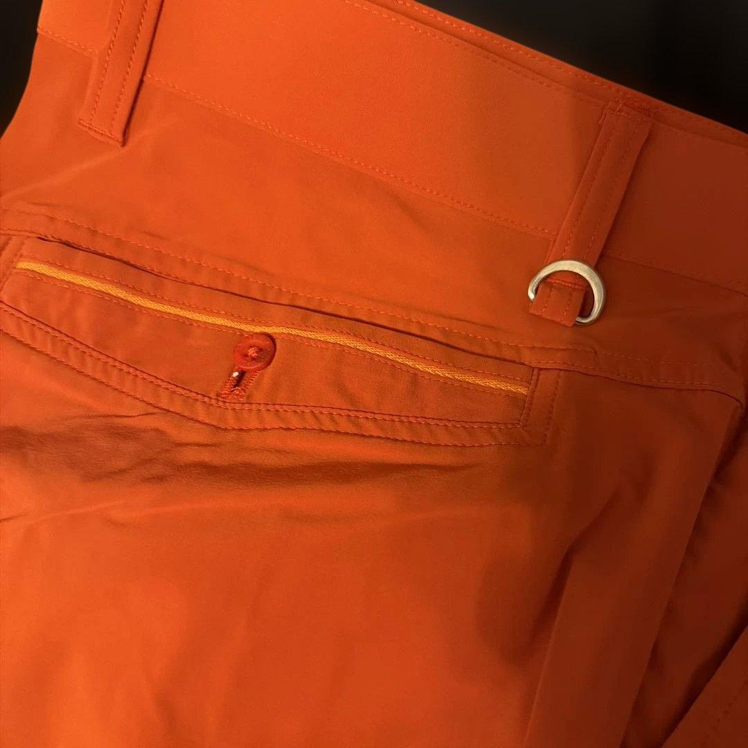 オレンジ ゴルフパンツ バックポケット付き