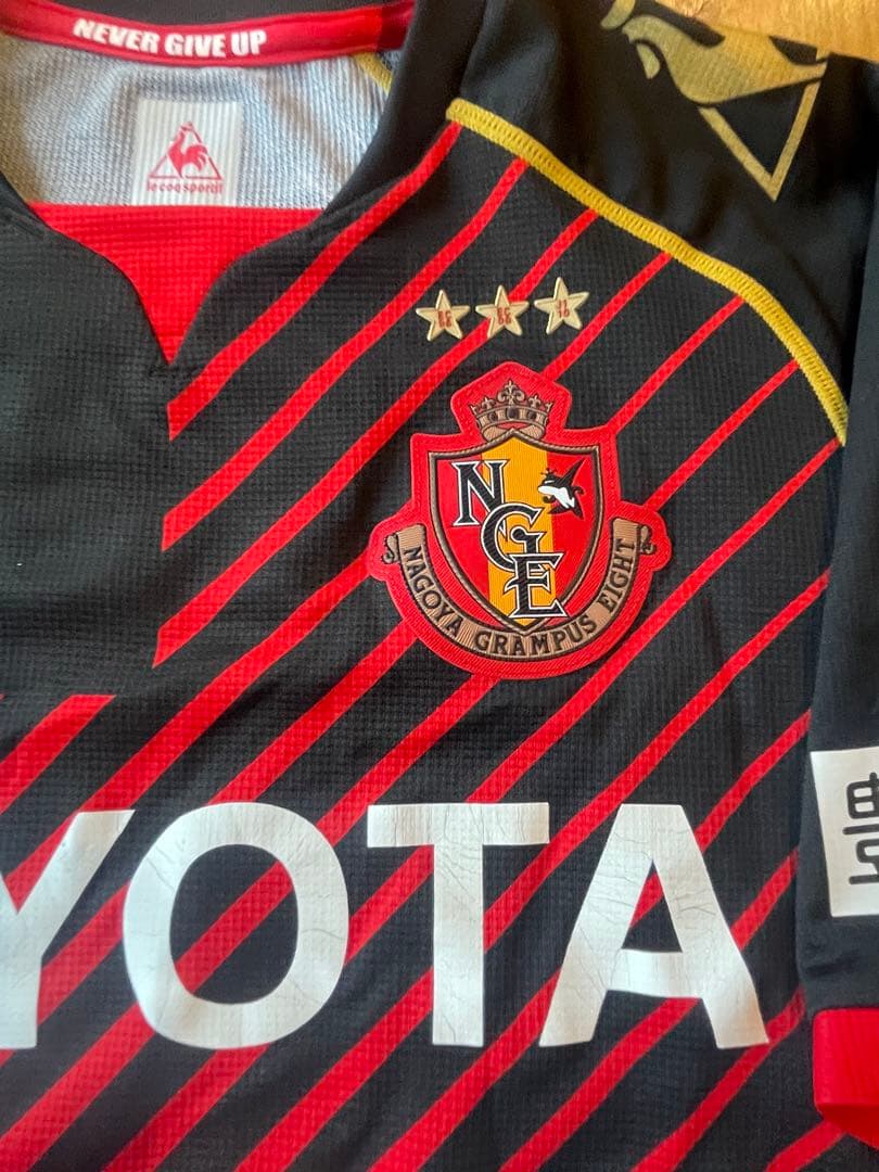 サッカーＪリーグ　名古屋グランパス 20周年記念ユニホーム　12サイズOサイズ