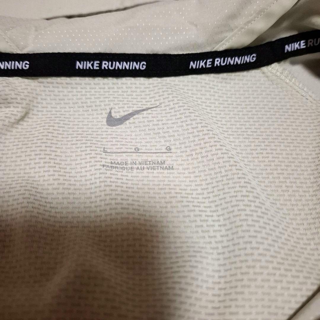 Nike ウィンドラ ンナー　レペル ランニングジャケッ　L ポケッ ト収納式