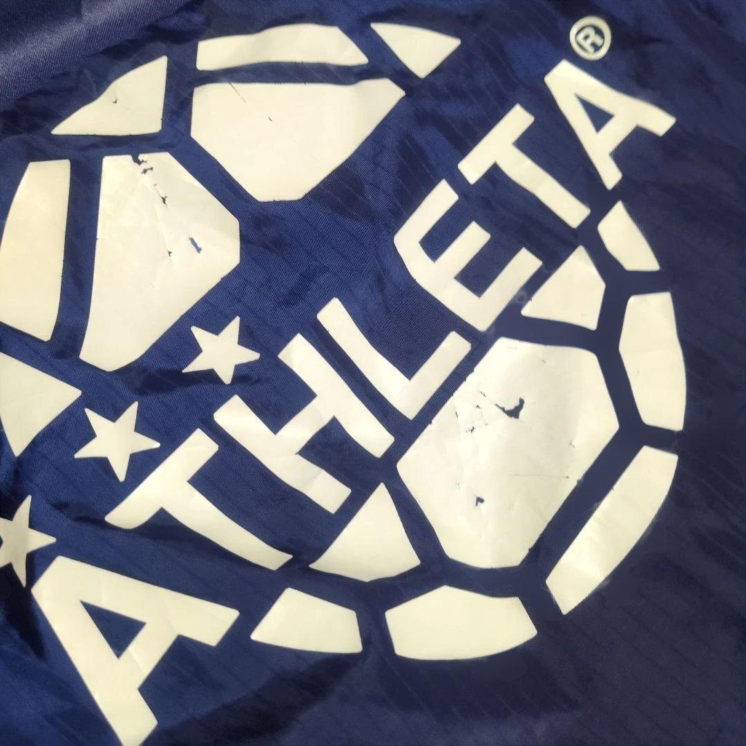 ATHLETA ネイビー ウィンドブレーカー
