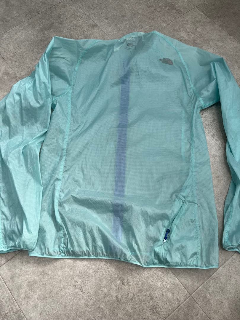 The North Face インパルスレーシングジャケット　ライトブルー