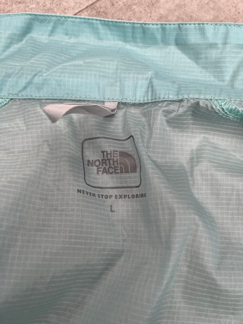 The North Face インパルスレーシングジャケット　ライトブルー