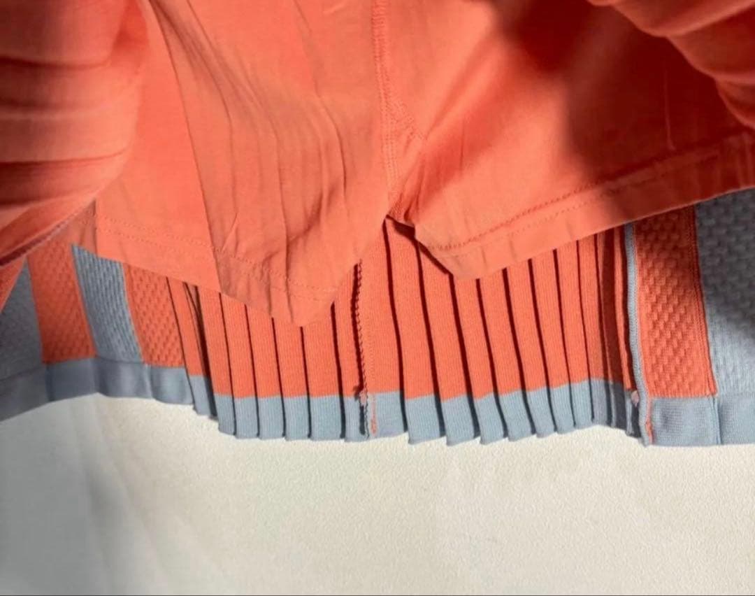 新品adidasゴルフ　ポロシャツ　プリーツスカートサーモンピンク　春色