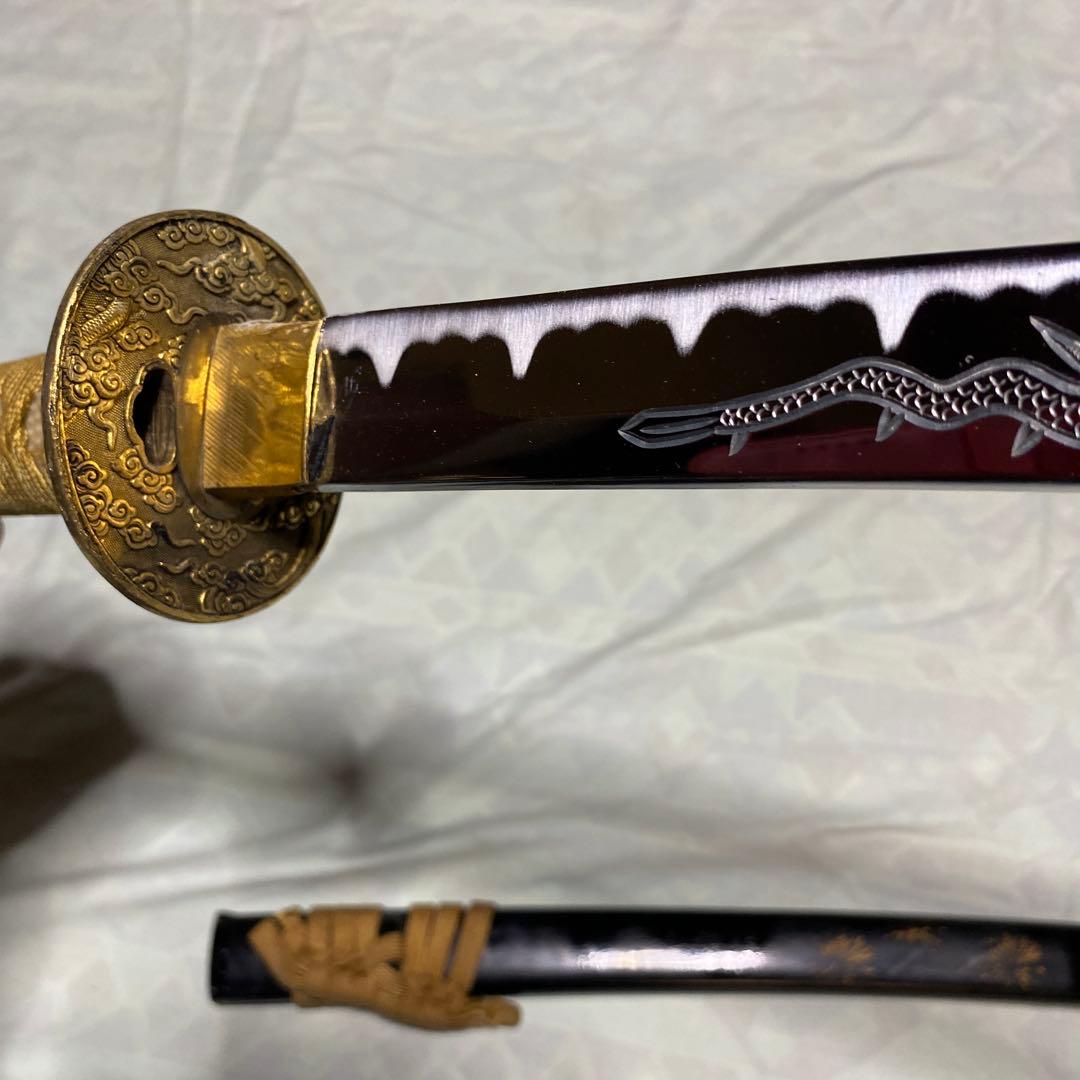 模造刀 黄色柄 雲龍楕円金鍔 花火絵黒鞘