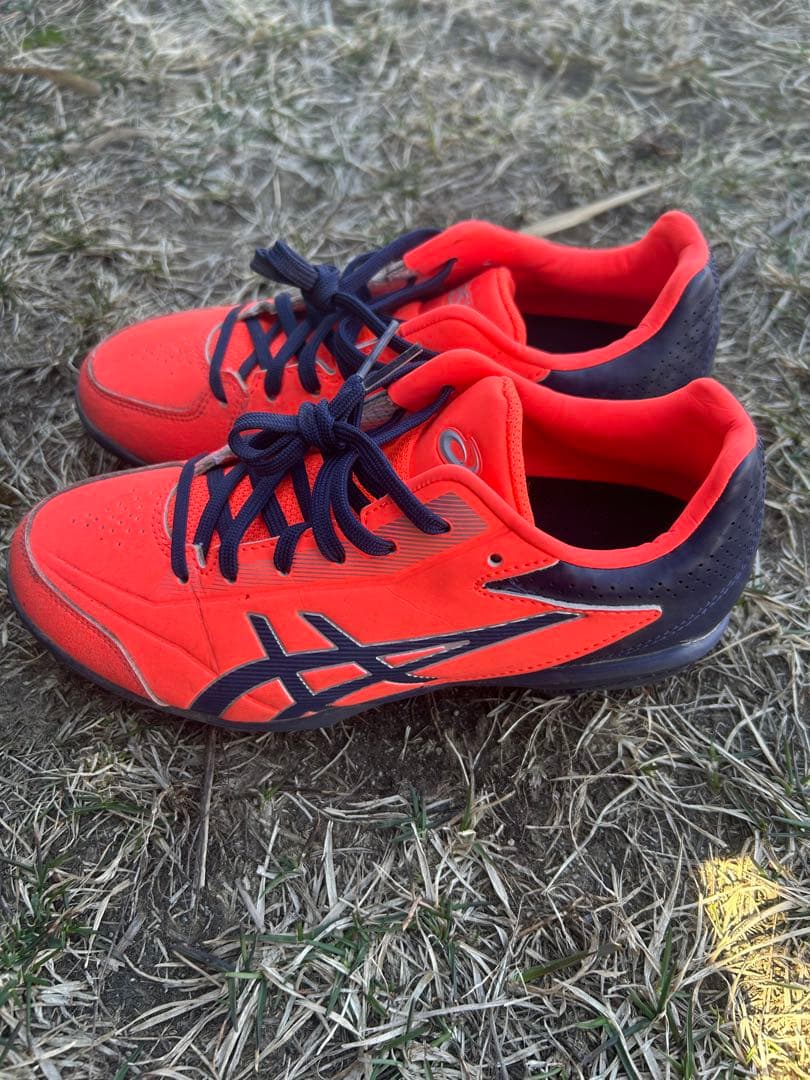 ASICS スパイクシューズ オレンジ/ネイビー