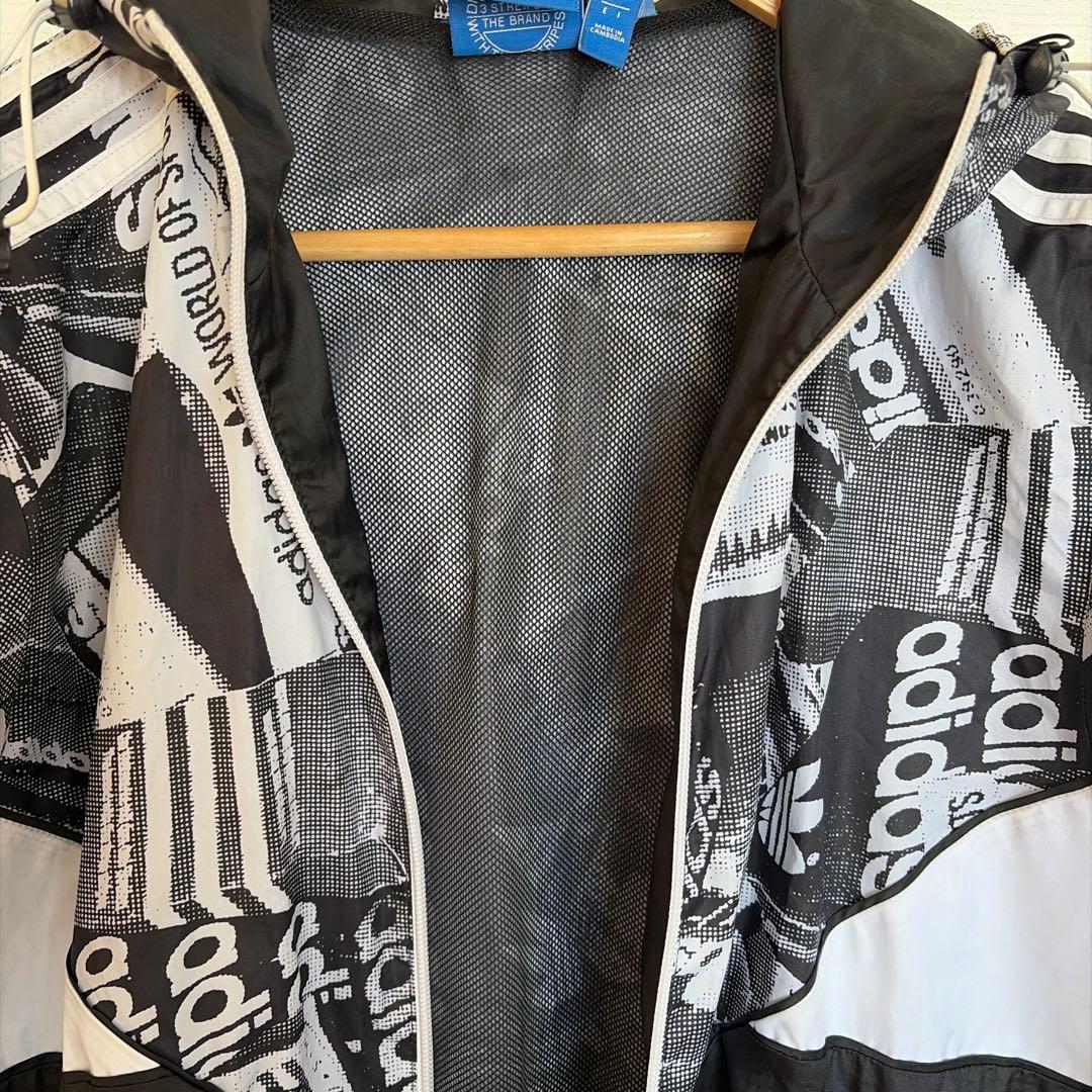 adidas グラフィックウィンドブレーカー XS
