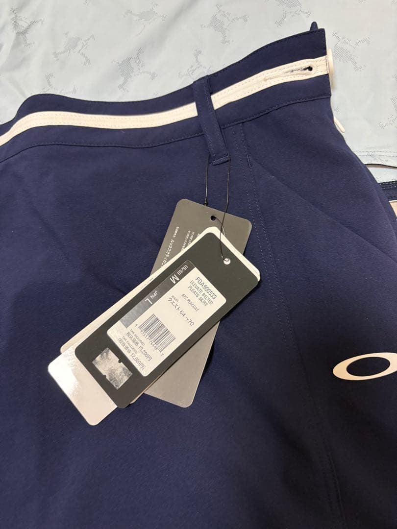 新品　LサイズOAKLEY オークリーゴルフセットアップ モックネック＆スカート