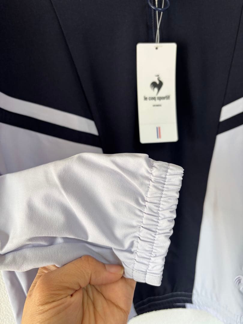 le coq sportif ウィンドブレーカー ネイビー