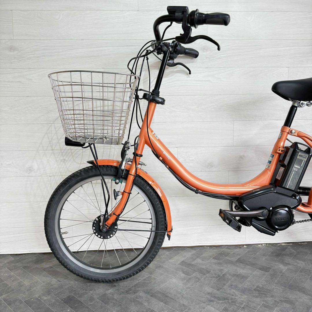 オレンジ 電動アシスト自転車 シティタイプ