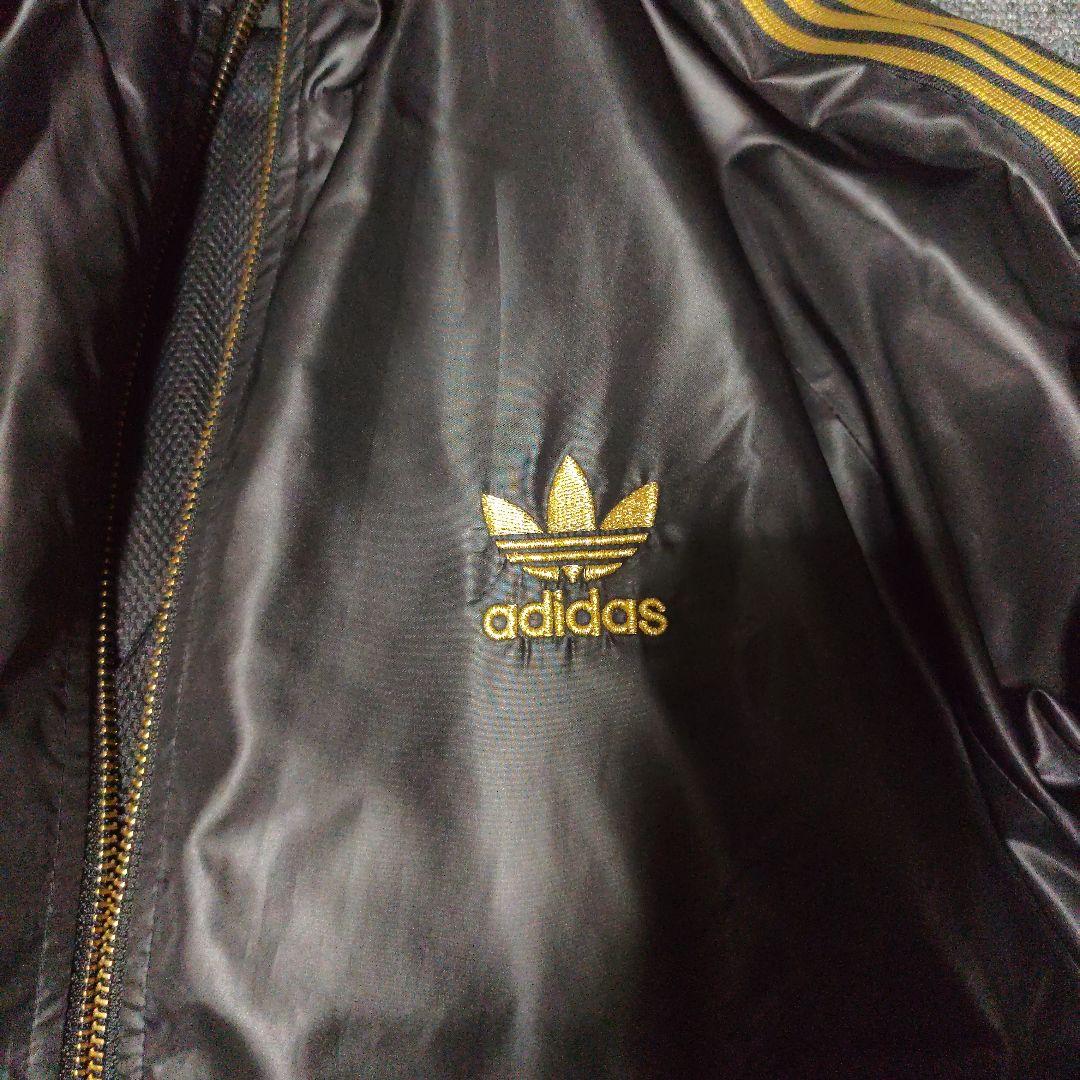 adidas ナイロンセットアップ ブラック ゴールド