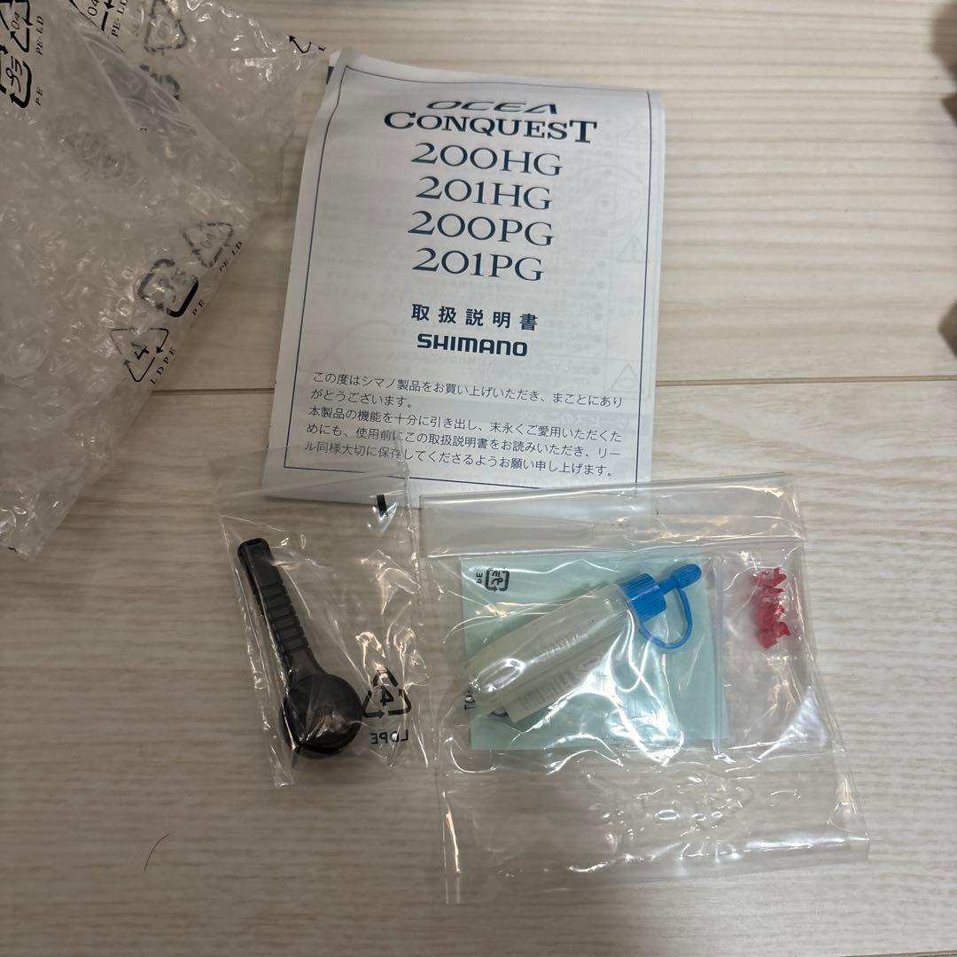 OCEA CONQUEST 201PG ベイトリール ゴールド