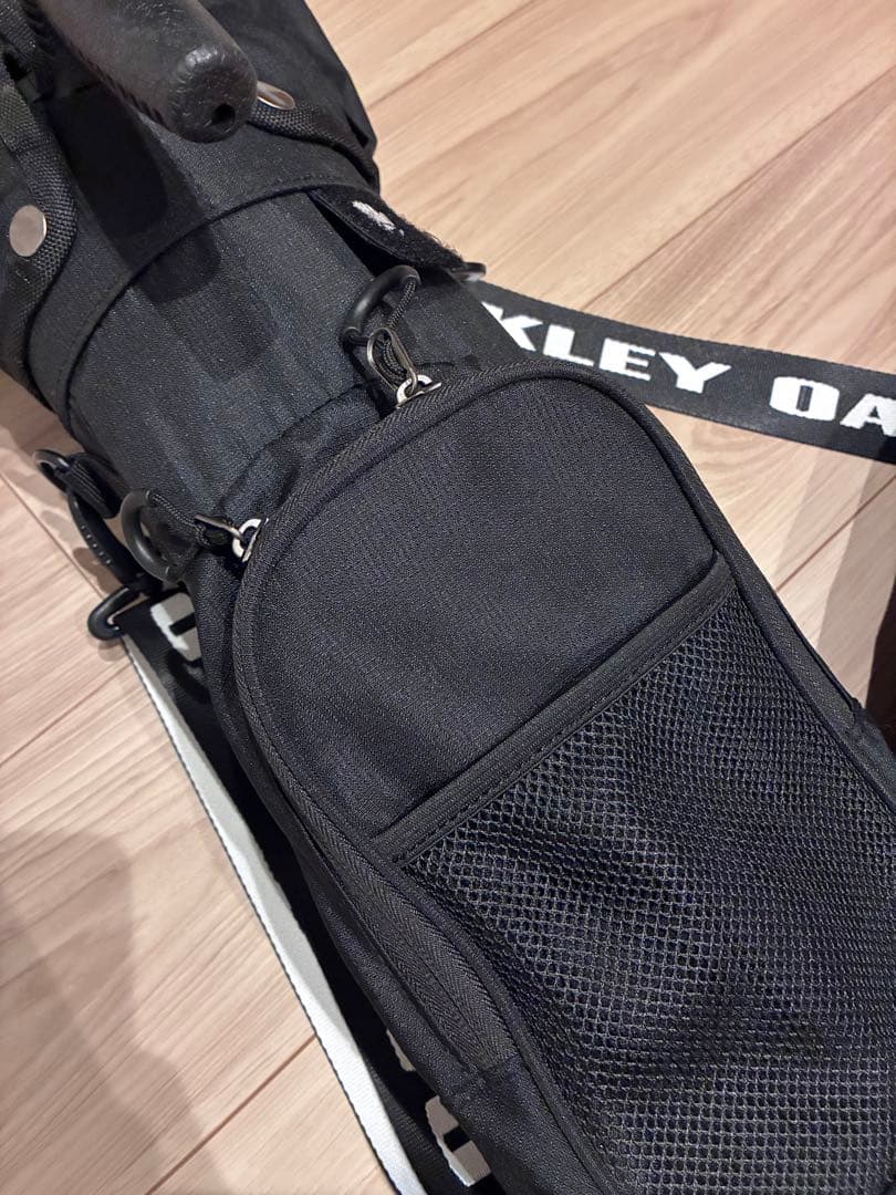 Oakley ブラック スタンドバッグ