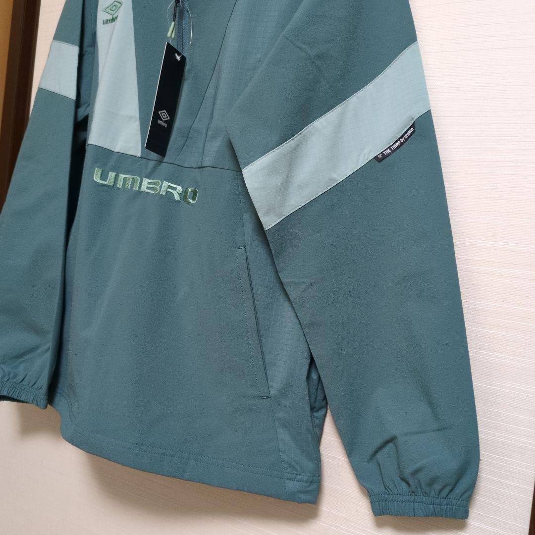 【新品未使用】umbro グリーン ピステ・ウィンドブレーカー