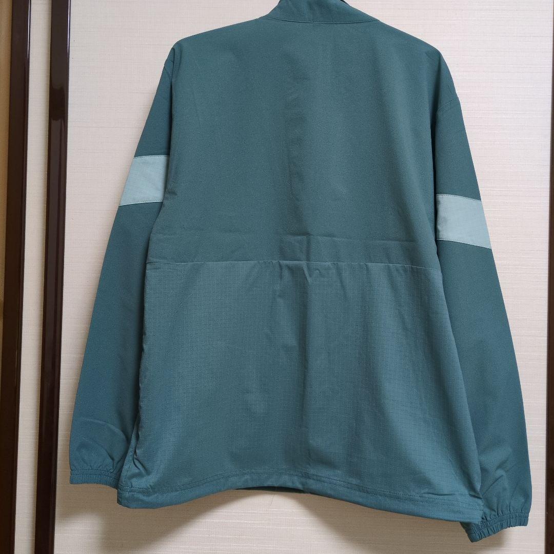 【新品未使用】umbro グリーン ピステ・ウィンドブレーカー