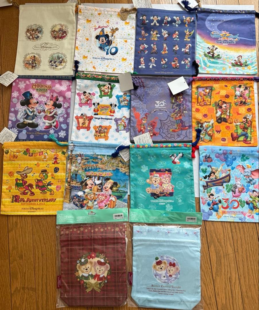新品タグ付東京ディズニーリゾート巾着14点セット ダッフィーミッキーミニーホテル