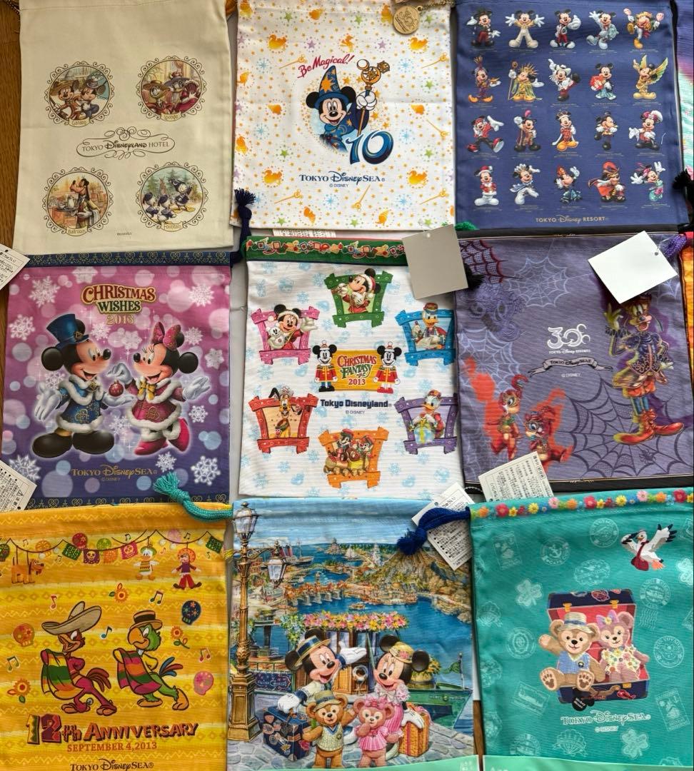 新品タグ付東京ディズニーリゾート巾着14点セット ダッフィーミッキーミニーホテル