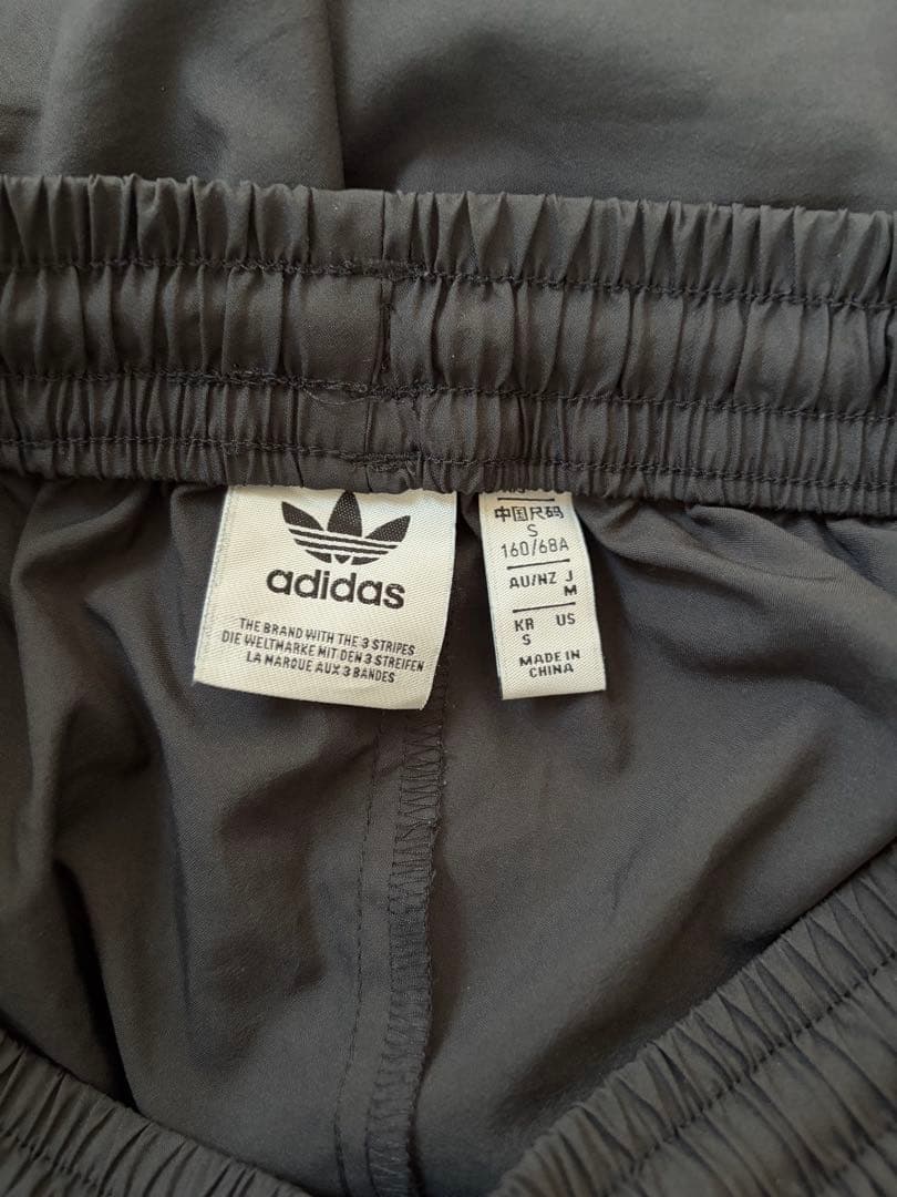 adidas originals アディレニウム ジップ トラックパンツ