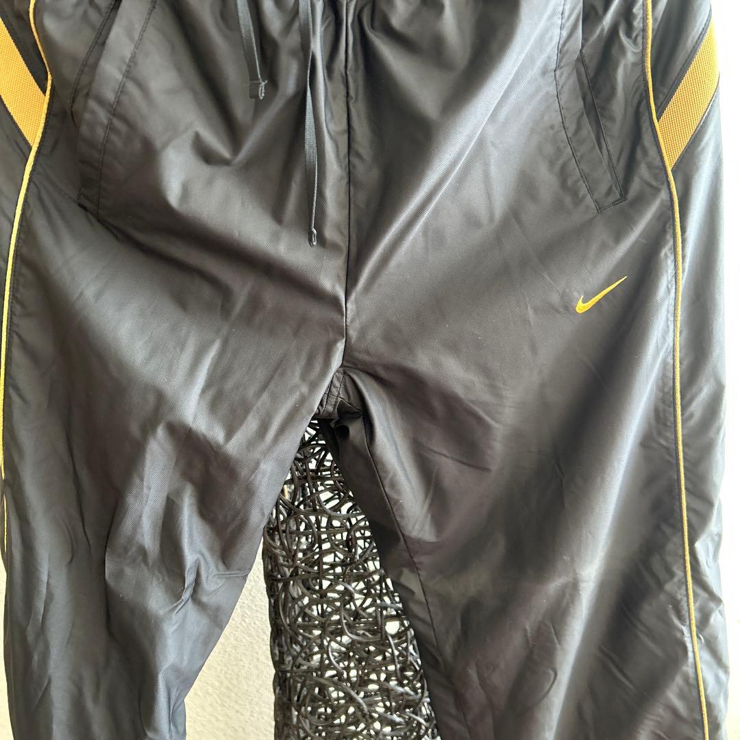 Nike ウィンブレ 上下　黒/金