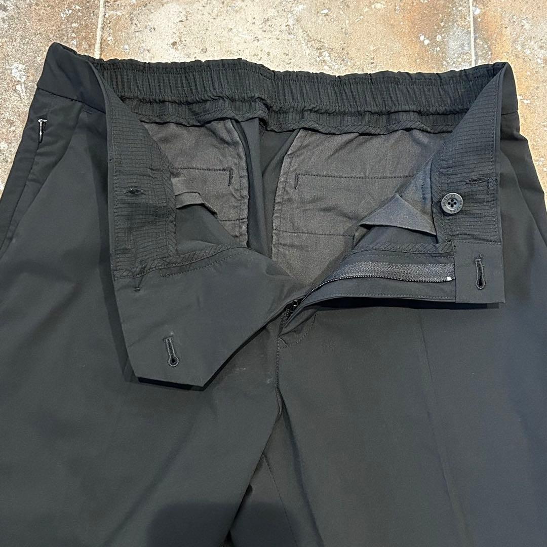 別注 ブリーフィング　パッカブルパンツ　ストレッチ　撥水性 ナノユニバース