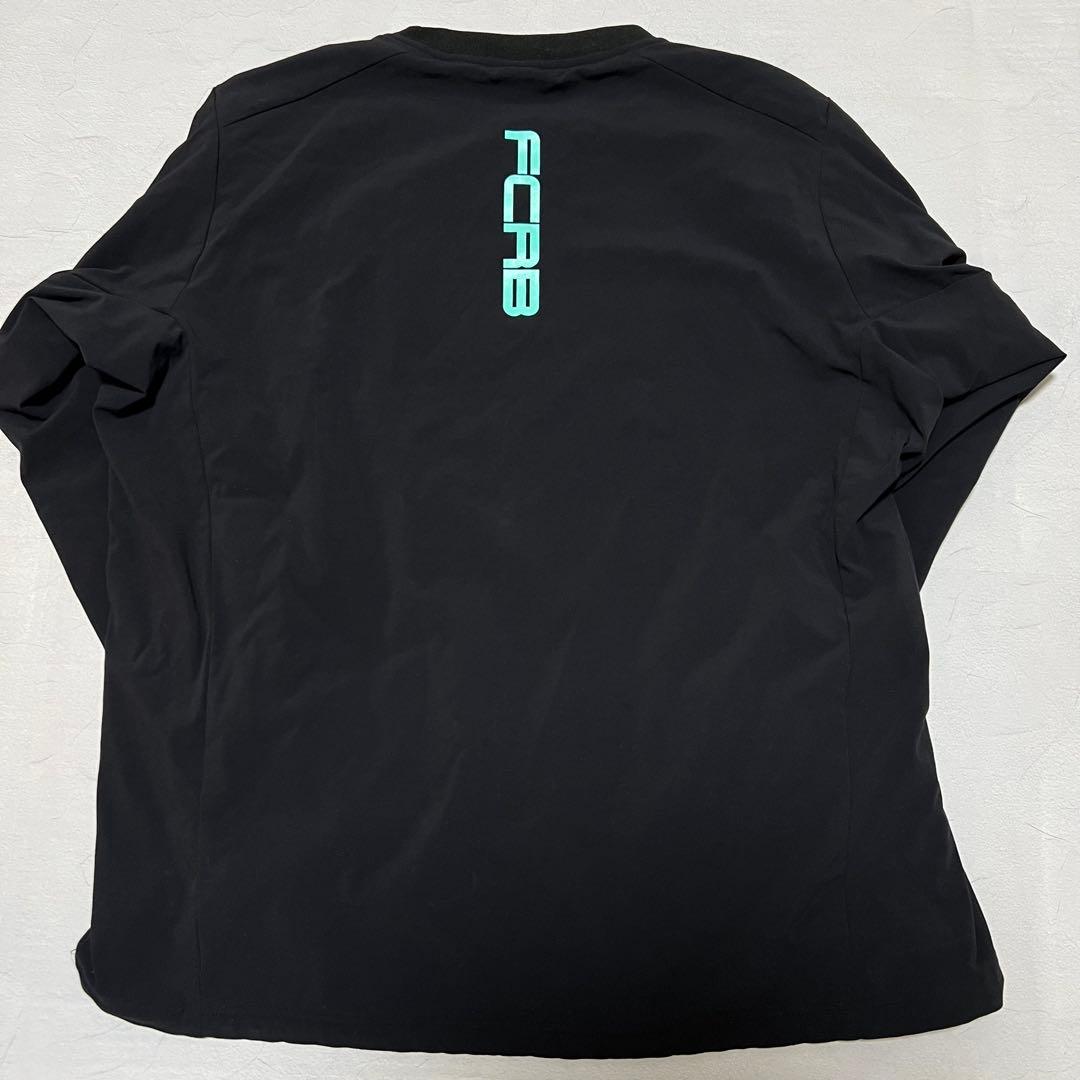 希少XL F.C.R.B. LYCRA セットアップ 黒 ティファニーブルー