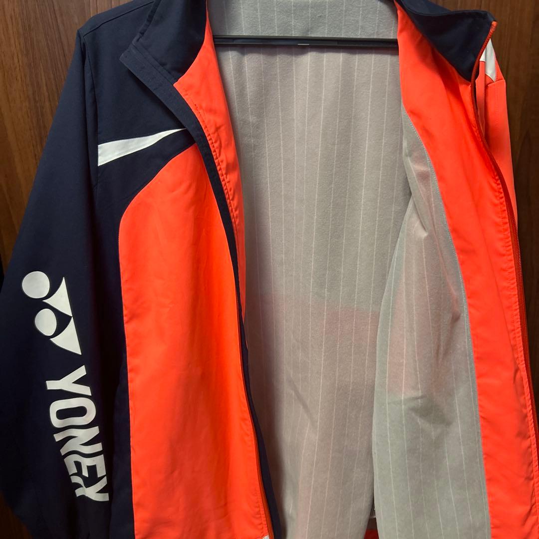 YONEX ジップアップジャケット オレンジ/紺