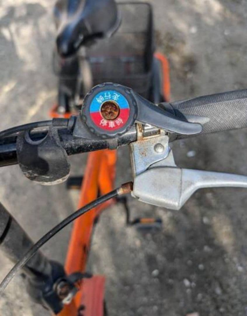 引き取り限定オレンジ折りたたみ自転車