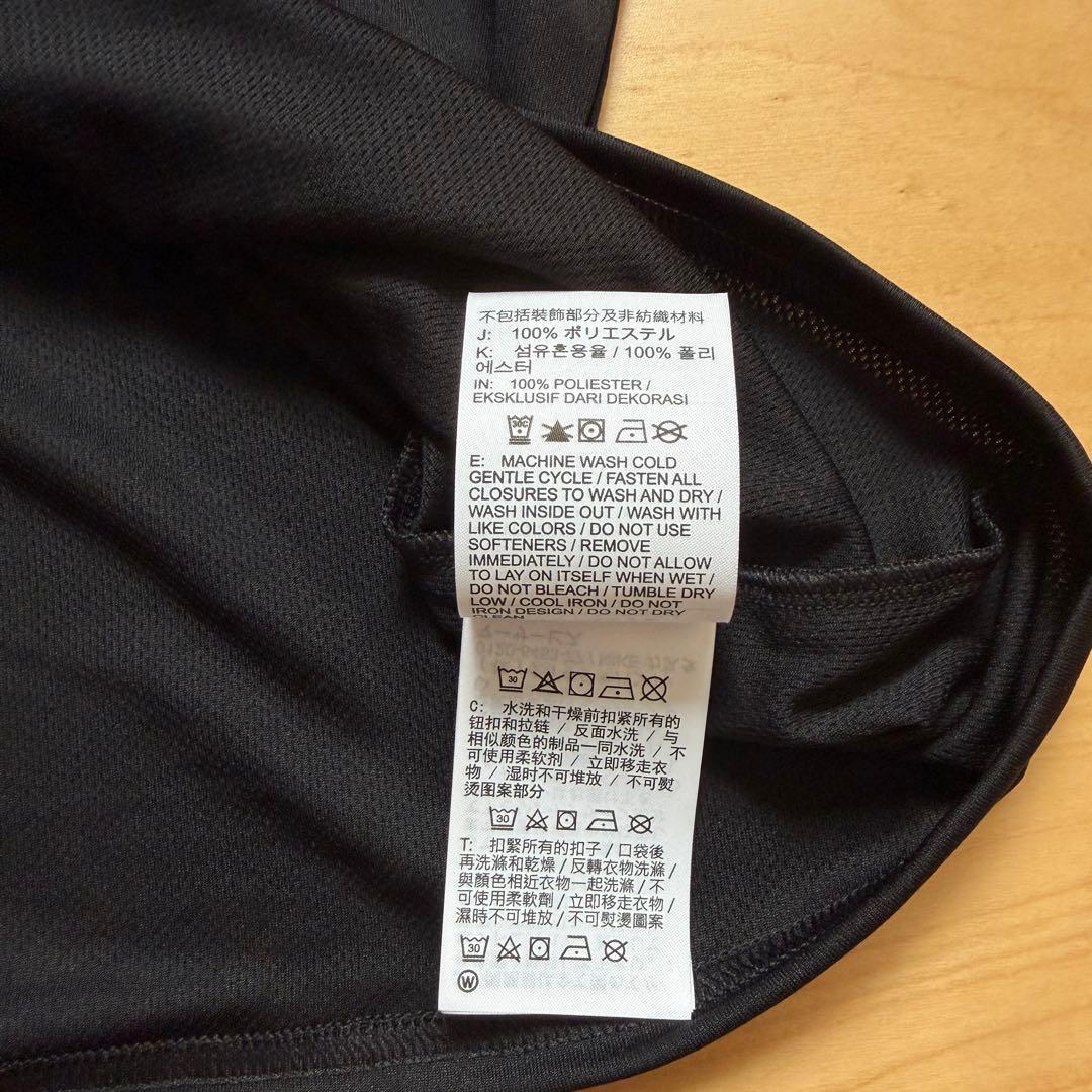 NIKEナイキ　ランニングウェア　長袖　ハーフジップアップシャツ　黒　XL 新品