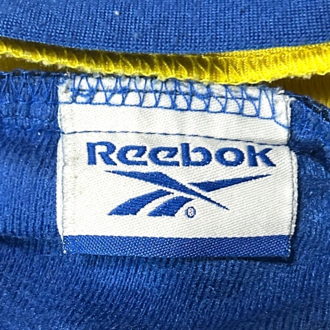 リーボック ReebokトラックパンツサイドスナップサッカーブレンビーIF青黄