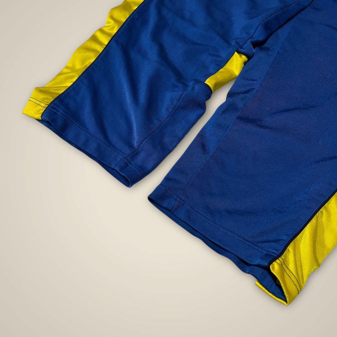 リーボック ReebokトラックパンツサイドスナップサッカーブレンビーIF青黄