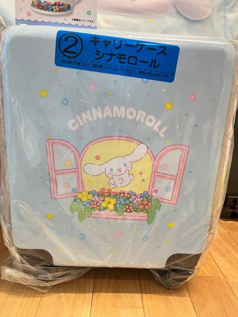 \購入した新品のダンボールで発送！/未開封　シナモロールキャリーケースオンバッグ