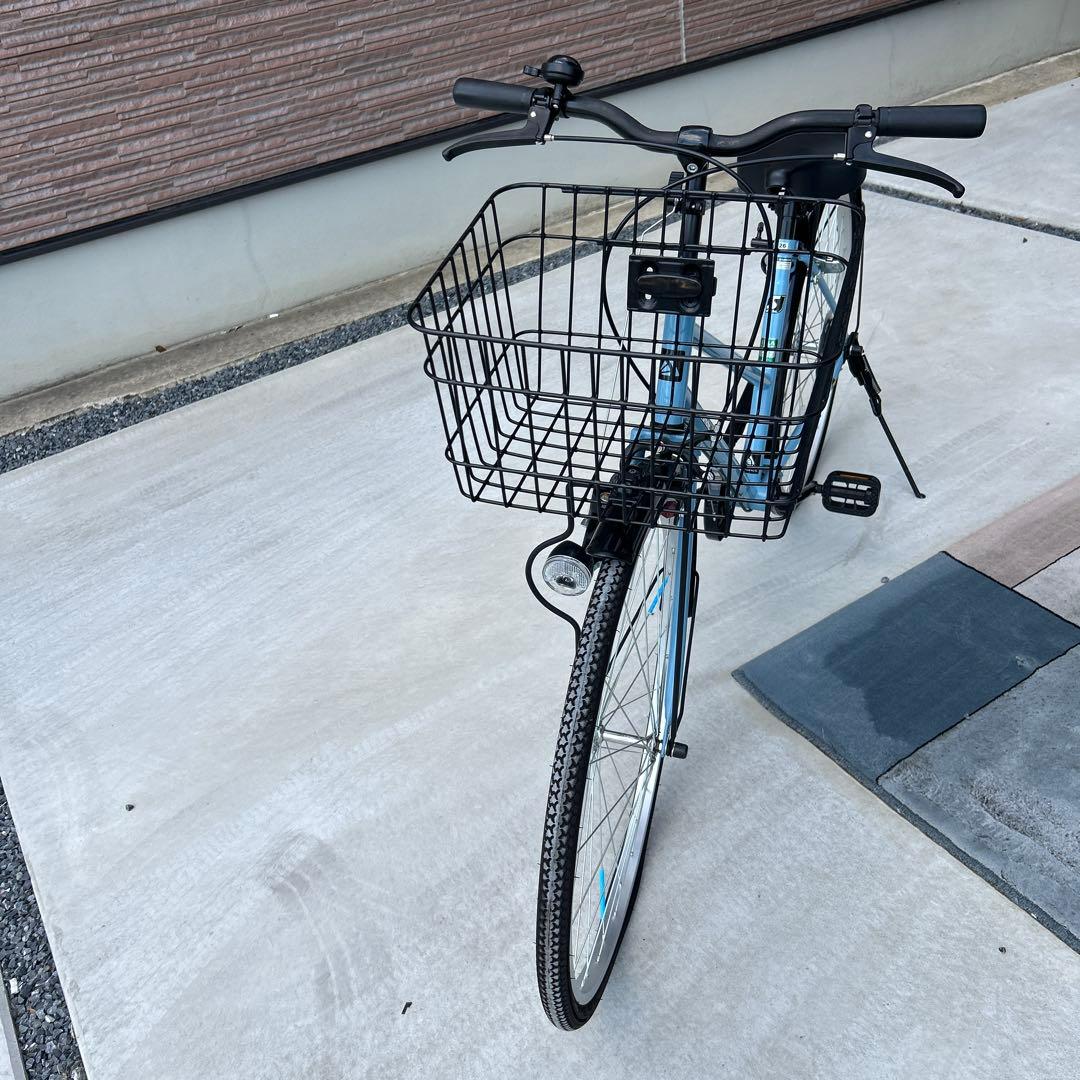 水色の26インチ自転車 前面バスケット付き